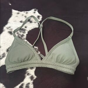 Women size XS green swimsuit top, adjustable straps and tie back, with padding